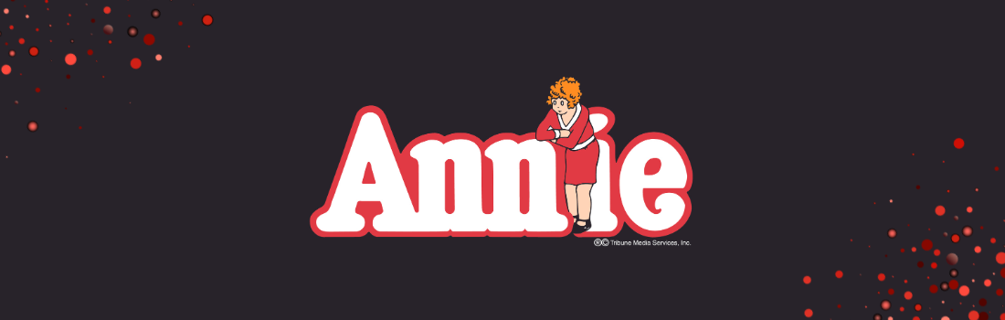 Annie show logo in white writing on dark background